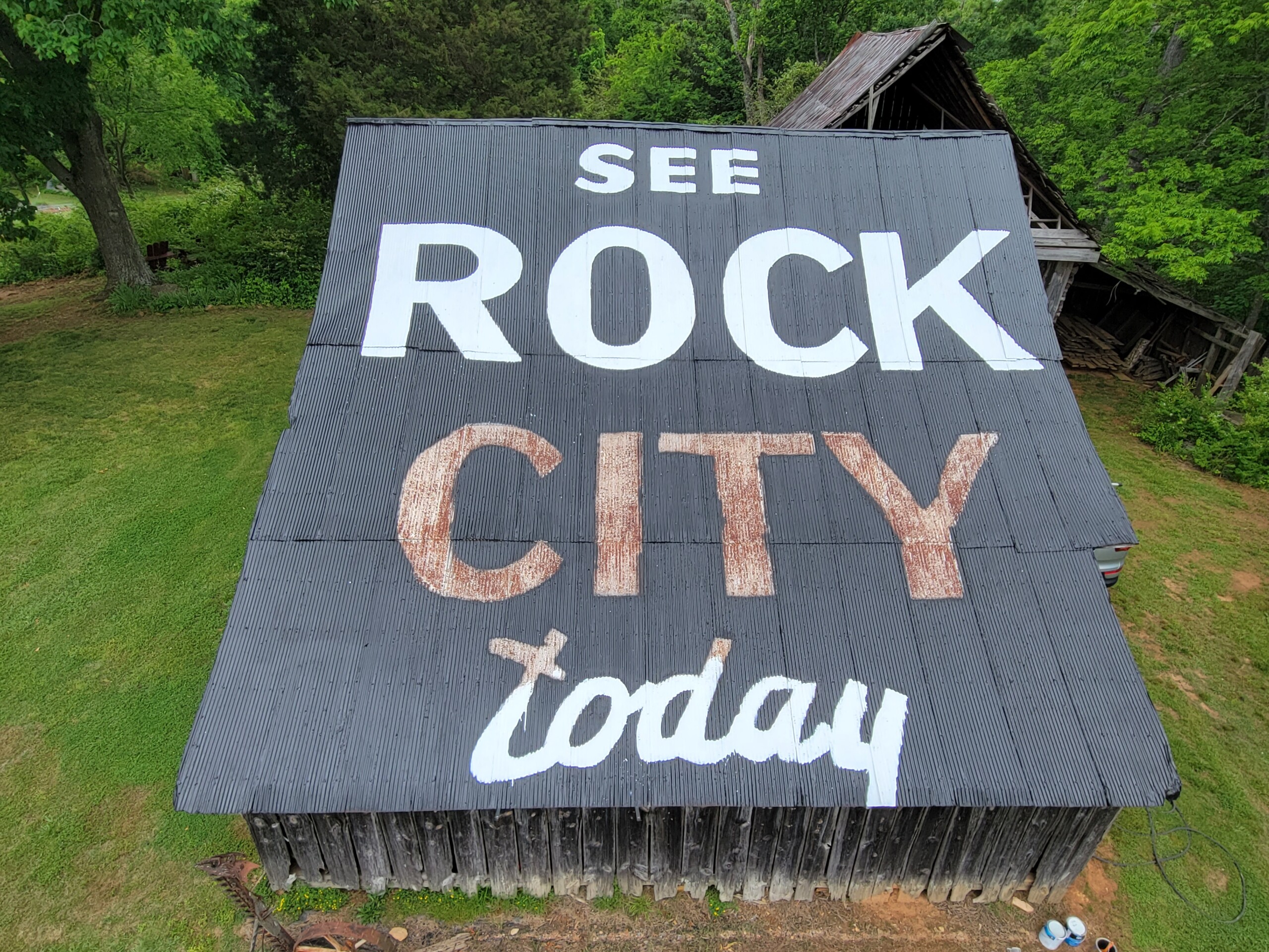 I let people come up and paint a bit on the lower letters. Everyone really got a kick out of lending a hand to help be a part of a barn repaint. Had a few potential assistants on my hands!