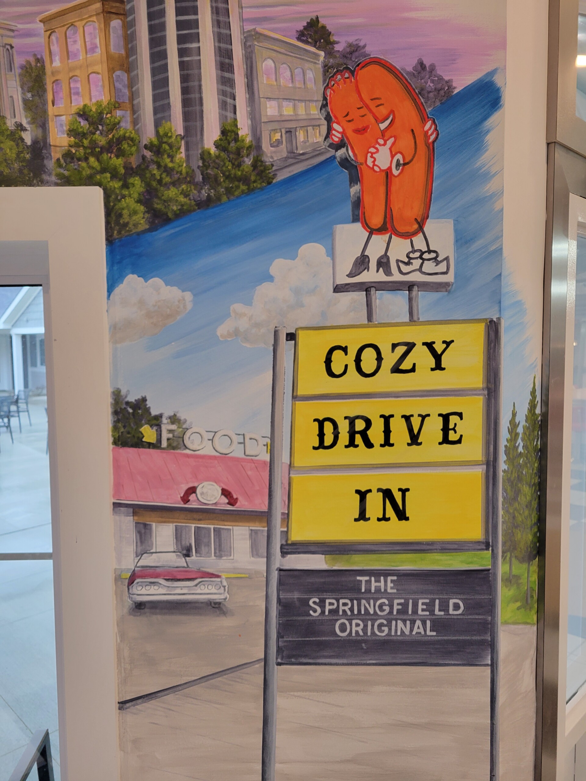 cozy drive in sign mural painting troy freeman