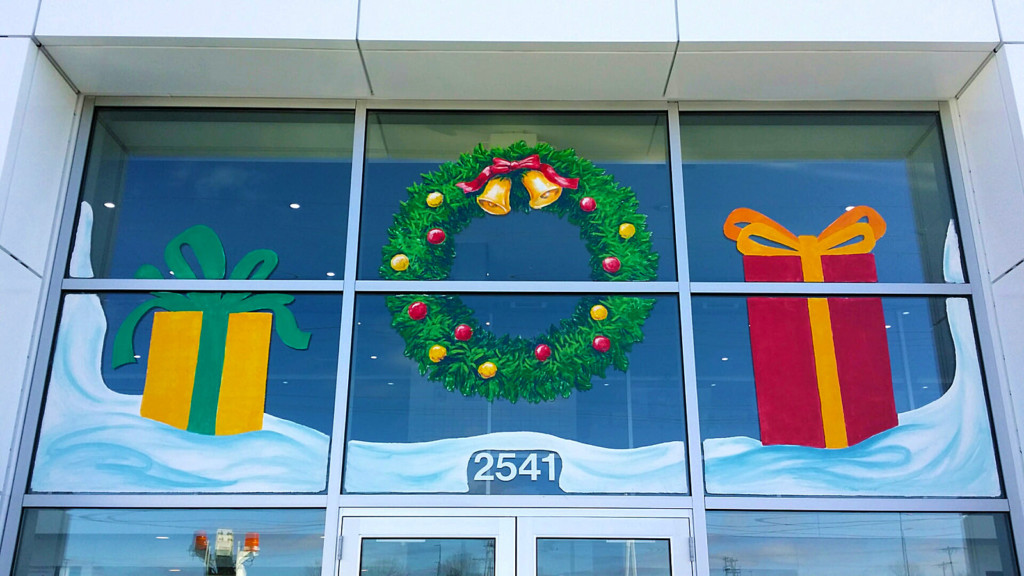 christmas window painting wreath and presents springfield illinois