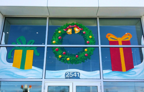 christmas window painting wreath and presents springfield illinois